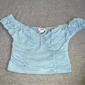 NWOT Off shoulder cropped blouse.